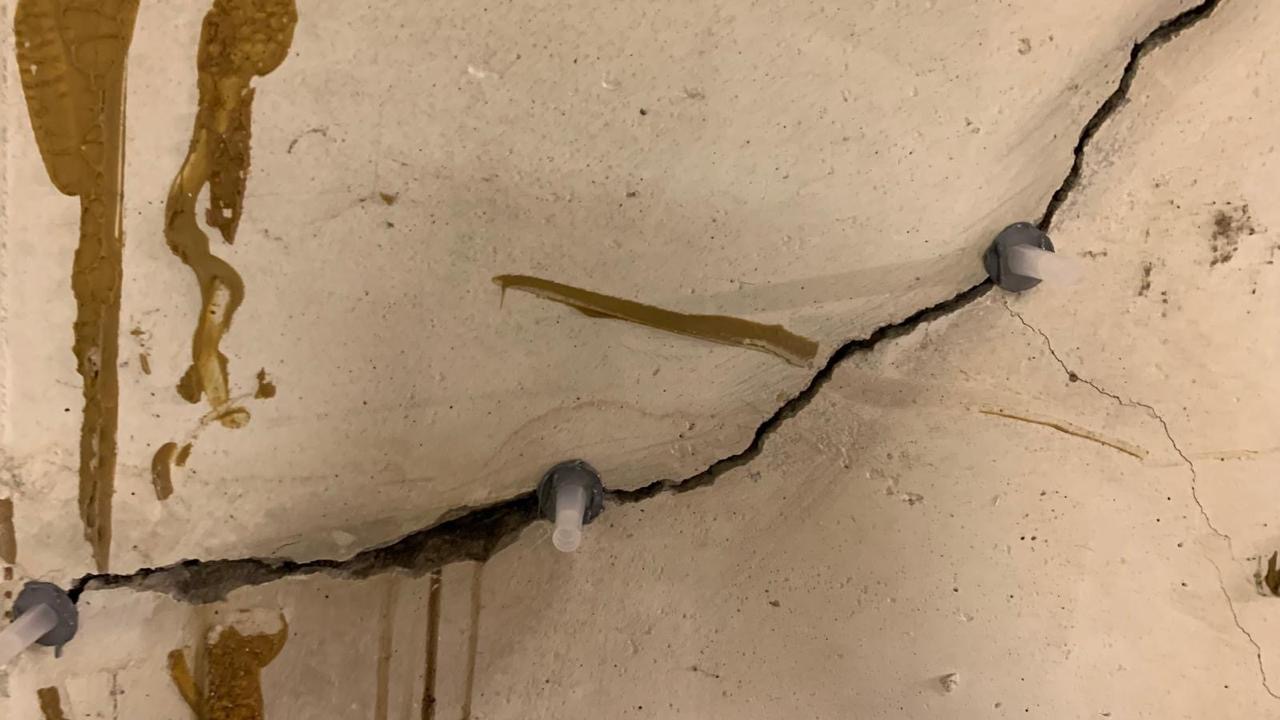 Concrete crack injection repair in progress